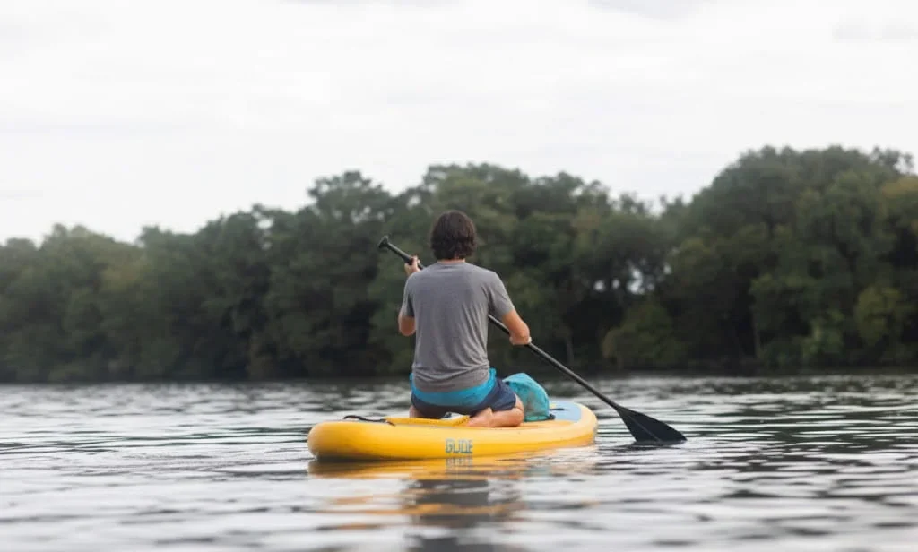 Solo traveler enjoying water activity in a US city